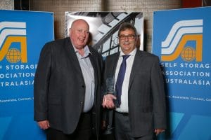 Dallas Dogger accepts award from Keith Edwards Chairman SSAA